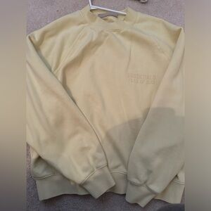 fear of god essentials light yellow crewneck size small